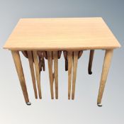 A nest of 20th century teak tables