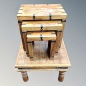 A nest of three Sheesham wood tables together with a coffee table