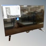 A JVC 43 inch LED smart 4K Ultra HD TV model LT-43C862 with instructions and remote