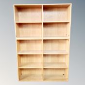 Two sets of oak shelving