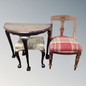 An Edwardian side table on claw and ball feet,