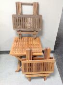 Three folding teak occasional tables