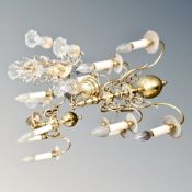 A continental brass eight-way light fitting together with a further box containing two brass light