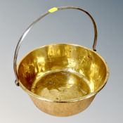 A brass cast iron-handled jam pan.