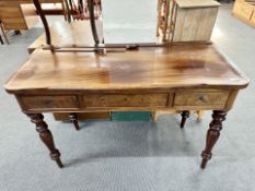 A 19th century mahogany three drawer side table