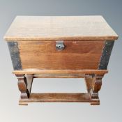 An oak storage box on stand