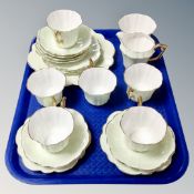 A tray of English gilded bone china.