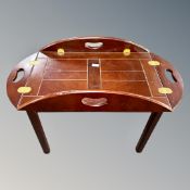 A mahogany butler's tray on stand