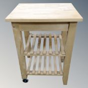 A beech kitchen trolley