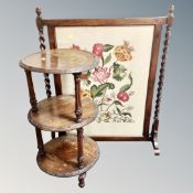 An Edwardian oak fire screen and a three tier stand