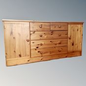 Two pine sideboards fitted with drawers