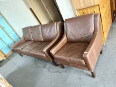 A mid century three seater brown leather settee and matching armchair