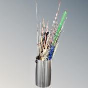 A large quantity of assorted fishing rods and landing nets