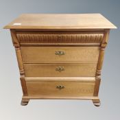 A 19th century carved oak four drawer chest