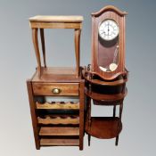 A bottle stand fitted a drawer, an occasional table,