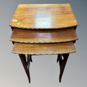 A 20th century mahogany nest of tables