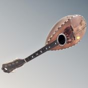A vintage inlaid bowl back mandolin.