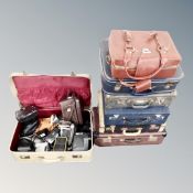A vintage case containing cameras,