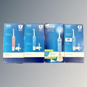 Four Oral-B Vitality Plus electric tooth brushes, sealed and new.