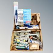 Two boxes containing cased tool kits, powercraft angle grinder, a Hozelock garden pump,