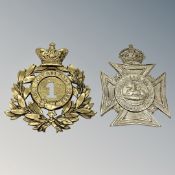 Two Edwardian helmet plates,