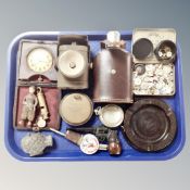 A tray containing assorted collectables to include a pipe in the form of a gun, decanter stoppers,