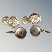 Two pairs of silver cuff links.