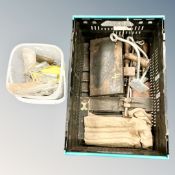 A crate of old tools and fittings