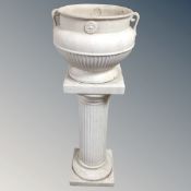 A ceramic classical-style twin-handled jardiniere on column stand