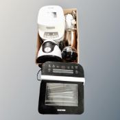 A Salter table rotisserie oven together with a box containing bread-maker, fryer,