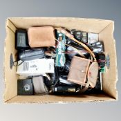 A box containing vintage and later cameras.