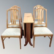 A six piece Nathan furniture teak dining room suite comprising of sideboard,