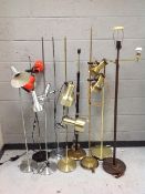 Nine assorted continental vintage and later floor and spot lamps.