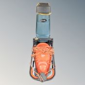 A Flymo Easiglide 300 electric lawn mower together with a garden TEC2400W electric shredder