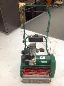 A Lloyd cylinder petrol 15S lawn mower with roller.
