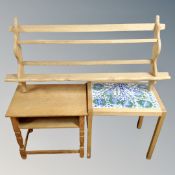 A Danish blonde oak wall rack together with a tiled top occasional table and further occasional