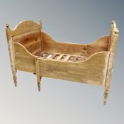 A 19th century pine adjustable 3' bed frame.