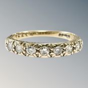 A 9ct yellow gold seven stone diamond half eternity ring, size P, 2.7g.