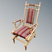 A vintage bobbin-turned rocking chair.