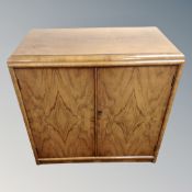 A mid-century walnut double door side cabinet,