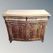 A 19th century mahogany serpentine fronted double door sideboard CONDITION REPORT: