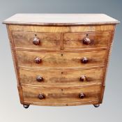 A Victorian mahogany bow fronted five drawer chest