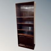 A set of 20th century bookshelves in a mahogany finish