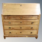 A 19th century oak fall front bureau