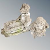 A concrete badger wheel barrow planter together with a further concrete garden figure of Buddha