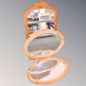 Three pine framed mirrors.