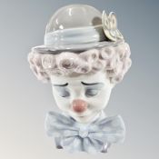 A Lladro bust of a clown no.