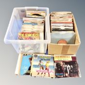 Two boxes of vinyl 7 inch singles and EPs, mid century and later.