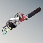 An Eckman electric chain saw with blade and chain