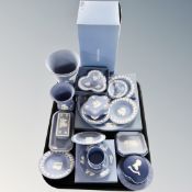 A tray of eighteen pieces of Wedgwood blue and white jasper ware (some parts boxed)